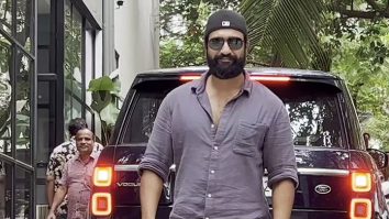 Vicky Kaushal smiles as he poses for paps