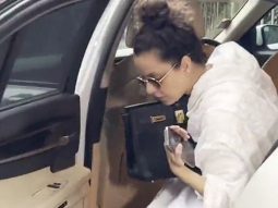 Kangana Ranaut poses in her white salwar and messy bun look