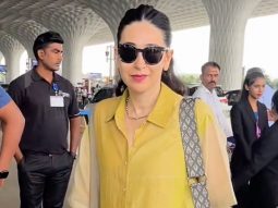 Karisma Kapoor poses for paps as she gets clicked at the airport