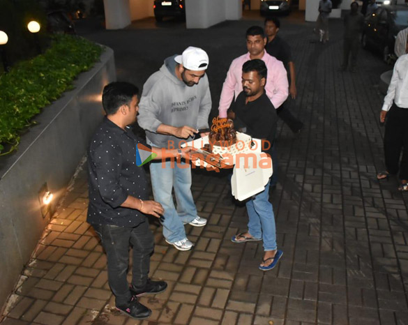 photos ranbir kapoor snapped cutting cake with fans and media outside bandra home 3