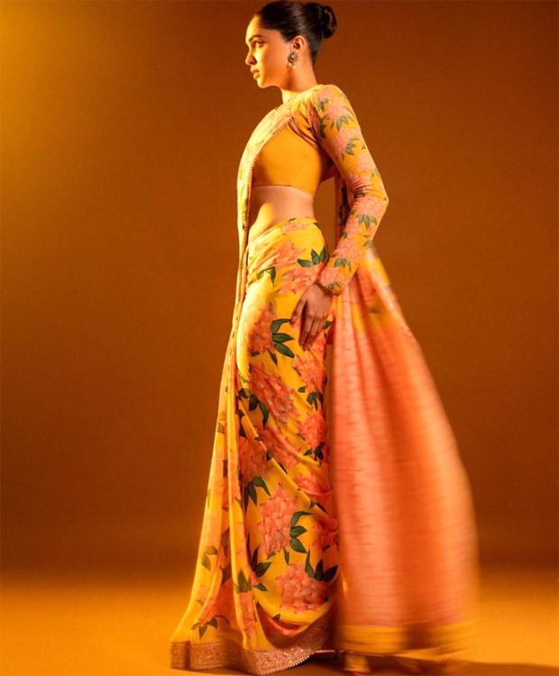 Sharvari Wagh looks stunning in a vibrant yellow floral saree, exuding flawless elegance
