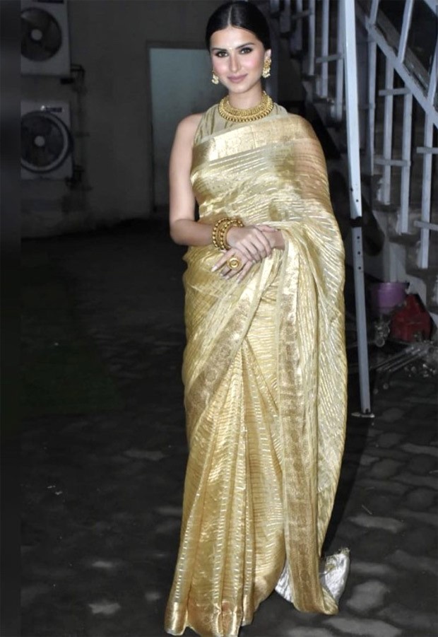 Tara Sutaria brings six yards of elegance in golden saree by Ekaya Benares