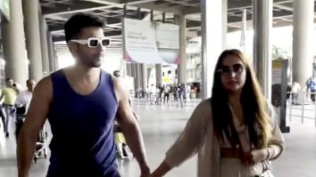 Varun Dhawan & Natasha Dalal walk hand in hand as they get clicked at the airport
