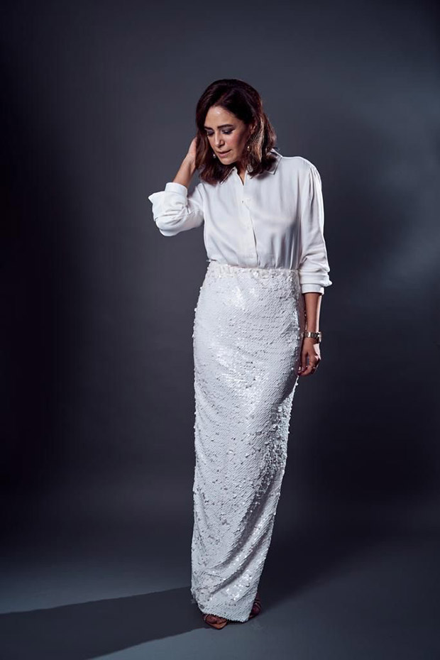Mona Singh is looking like a vision in white shirt styled with white sequin skirt