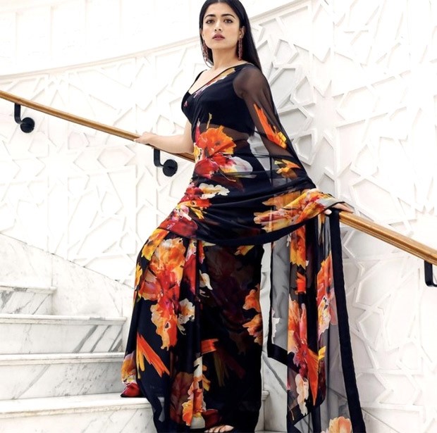 Rashmika Mandanna exuded sheer elegance as she adorned herself in a stunning dark floral saree