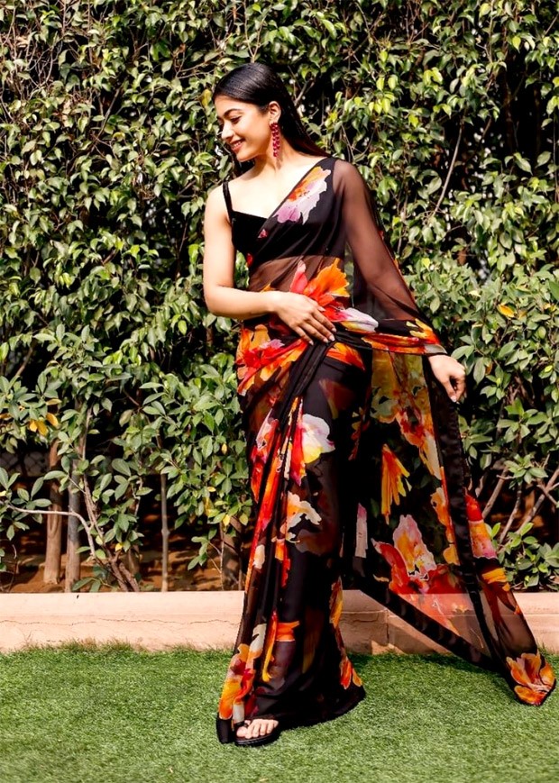 Rashmika Mandanna exuded sheer elegance as she adorned herself in a stunning dark floral saree