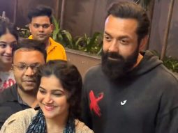 Bobby Deol poses for a picture with fans as he steps out in the city