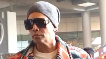 Karan Johar greets paps as he gets clicked with Yash & Roohi at the airport