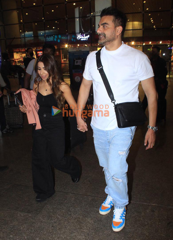 Photos: Arbaaz Khan and Sshura Khan snapped at the airport Photos: Arbaaz Khan and Sshura Khan snapped at the airport