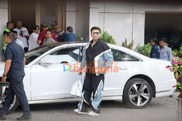 photos karan johar snapped at kalina airport 5