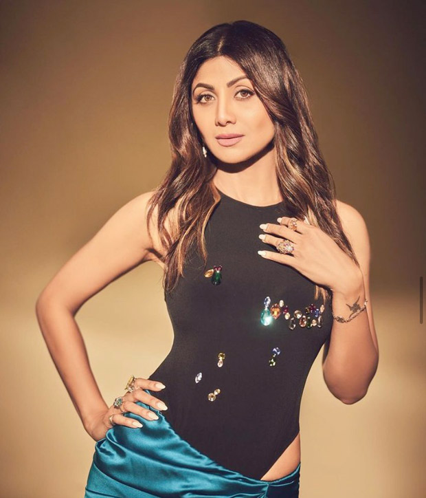 Shilpa Shetty slays in a chic black bodysuit paired with a stunning blue wrap skirt