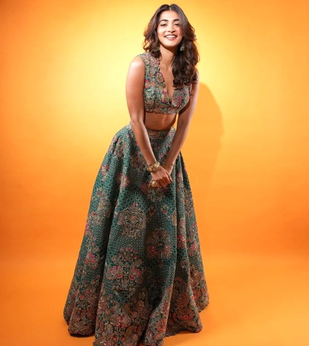 Pooja Hegde is setting the trendiest wedding guest style goals in a green floral Mrunalini Rao lehenga