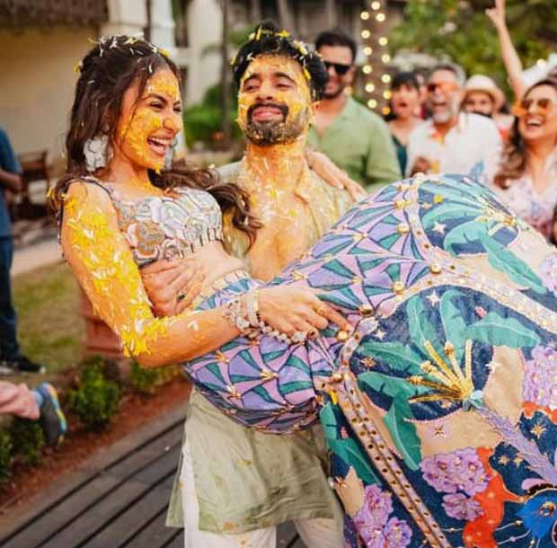 Rakul Preet Singh radiates joy in stunning beaded choli & moonlit jungle print purple lehenga by Papa Don’t Preach at her haldi ceremony with Jackky Bhagnani