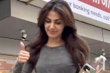 Rhea Chakraborty greets paps as she gets clicked post workout session