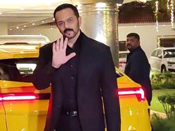 Rohit Shetty waves at paps as he arrives all decked up in his bright yellow car
