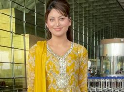 Urvashi Rautela cuts cake with paps as she gets clicked at the airport