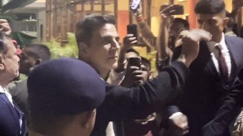 Akshay Kumar waves at his fans as he gets clicked by paps