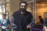 Arjun Kapoor waves at paps as he gets clicked at the airport in his beanie