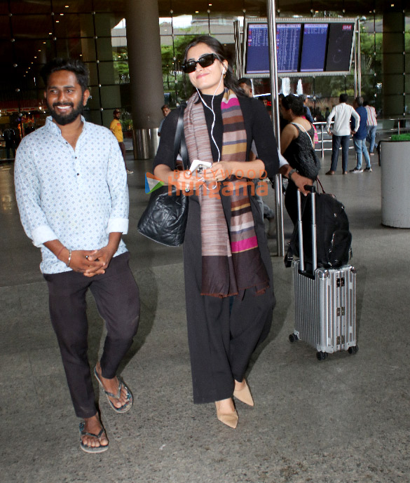 Photos: Rashmika Mandana and Jr NTR snapped at the airport