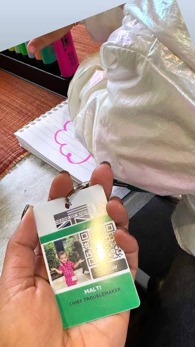 Priyanka Chopra Jonas presents her daughter Malti's credentials as 'Chief Troublemaker' on the set of 'Heads Of State'.