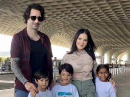 Sunny Leone gets clicked with her kids as they twin in white at the airport