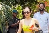 Malaika Arora gets clicked in her neon gym outfit post workout session