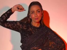 Describing grace in her beautiful black saree! Malaika Arora