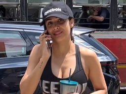 Malaika Arora waves at paps she rushes for her workout sesh