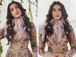Nora Fatehi dazzles in classic metallic silk lehenga by Varun Bahl paired with bodysuit and pink feather collar