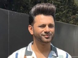 Rahul Vaidya strikes a pose for paps as he gets clicked on set
