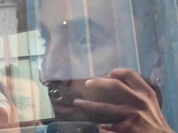 Ranbir Kapoor waves at paps from his car as he gets clicked in the city