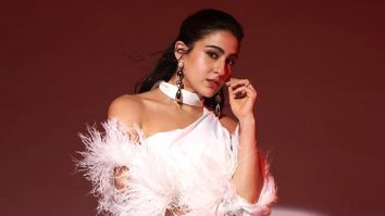 Sara Ali Khan brings elegance in a white cut-out dress paired with a luxurious fur-enrich cape