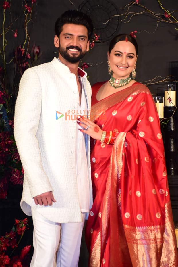 Sonakshi Sinha stuns as a traditional bride in red “chand buta” Banarasi saree from Raw Mango worth Rs. 79,800 for her wedding reception with Zaheer Iqbal 