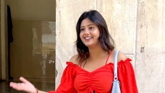Anjali Arora smiles as she poses for paps in a red crop top & denims
