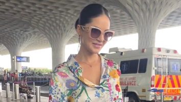 Sunny Leone cheerfully greets paps at the airport