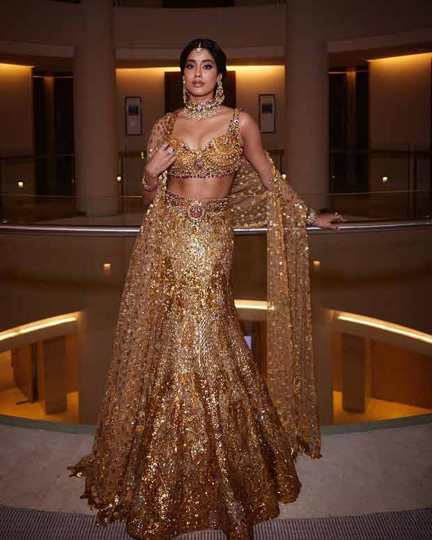 Janhvi Kapoor exudes golden grandeur in bedazzled Falguni Shane Peacock mermaid-style lehenga constructed using real gold temple jewelry at Anant Ambani-Radhika Merchant wedding 