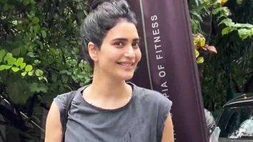 Karishma Tanna displays a happy mood as she gets clicked outside gym