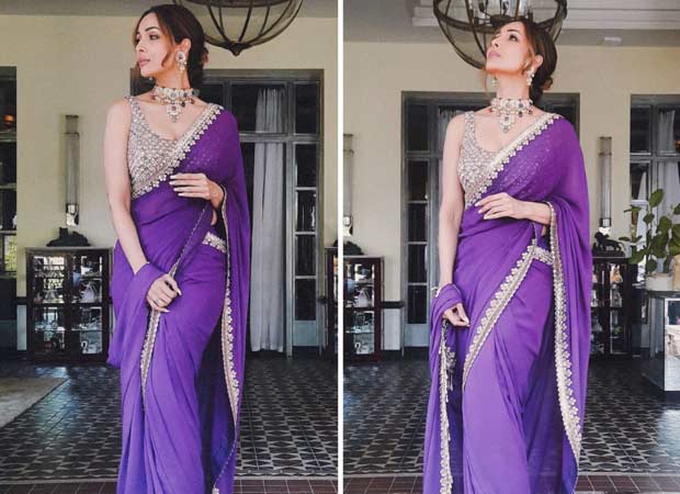 Malaika Arora stuns in a vibrant purple saree from Arpita Mehta