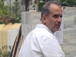 Aanand. L. Rai gets clicked by paps as he attends a funeral