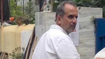 Aanand. L. Rai gets clicked by paps as he attends a funeral