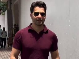 Varun Dhawan poses with fans as he gets clicked in the city