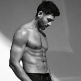 Kartik Aaryan flaunts his toned abs in the new monochrome cover of GQ
