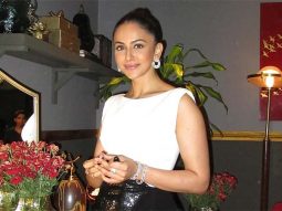 Rakul Preet Singh stuns in black and white gown with sleek high bun