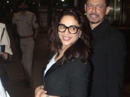 The timeless diva! Madhuri Dixit smiles for paps at the airport