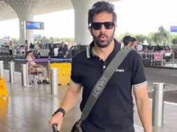 Kabir Khan gets clicked in a black tshirt at the airport
