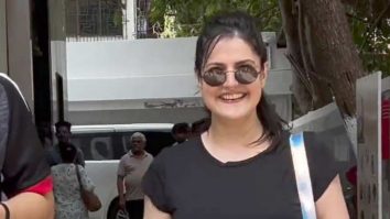 Zareen Khan poses for a picture with fans as she gets clicked post workout
