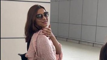 Saiee Manjrekar poses for a picture with her fans at the airport