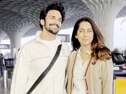 Anusha Dandekar poseing in white at the airport