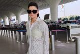 Urvashi Rautela spotted at the airport in a white dress