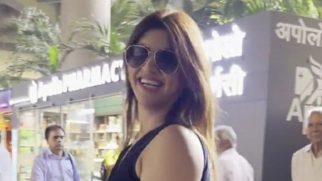 Akanksha Puri dances with a pap on the airport